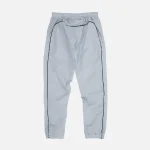 Syna World Track Trousers – Grey Syna Worlds. The latest in unisex winter fashion. Affordable, unique and high-quality.