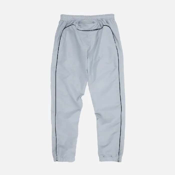 Syna World Track Trousers – Grey Syna Worlds. The latest in unisex winter fashion. Affordable, unique and high-quality.