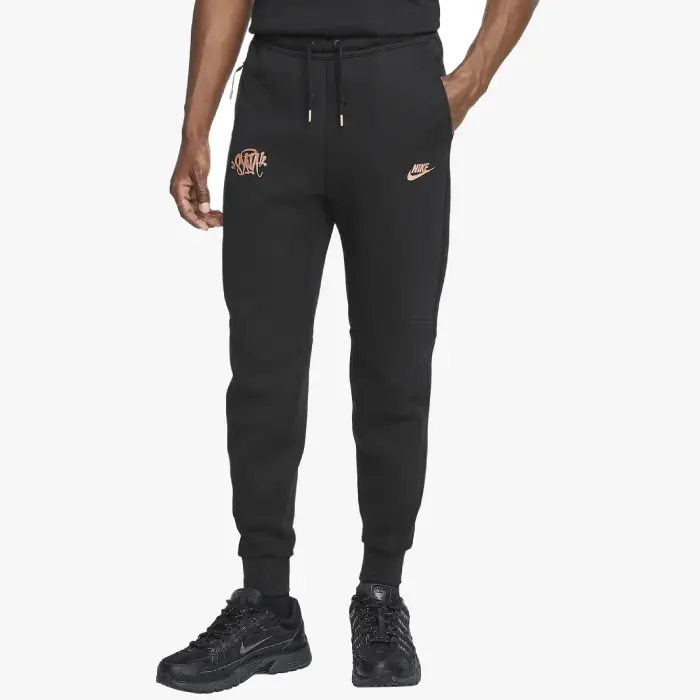 Shop the stylish Black Cee Tech fleece tracksuit bottoms by Syna World x Nike Central from Syna World x Nike Central at Syna World.