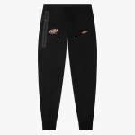 Shop the stylish Black Cee Tech fleece tracksuit bottoms by Syna World x Nike Central from Syna World x Nike Central at Syna World.