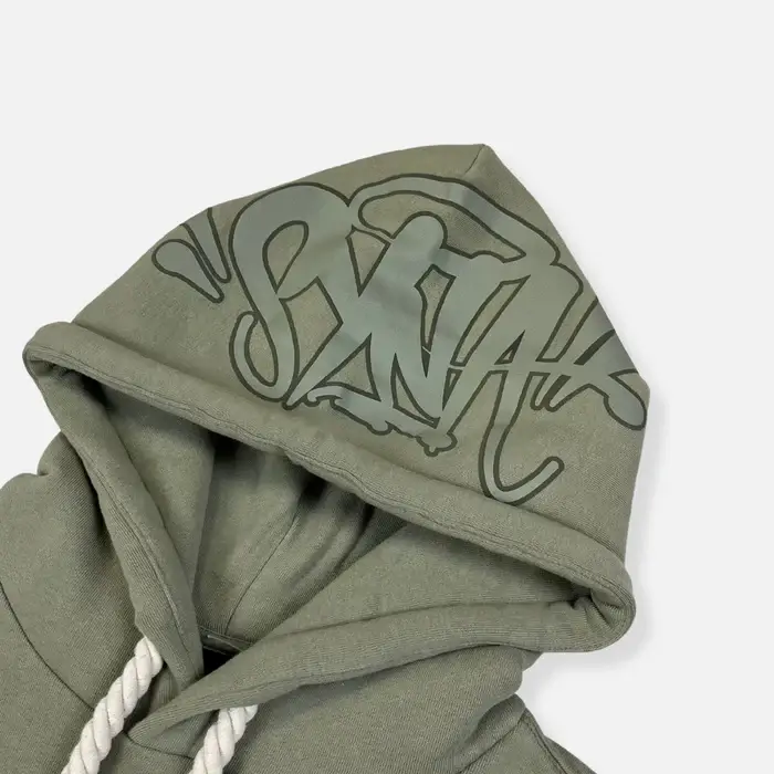 Discover the Synaworld Syna Logo Salvia Hooded Top in our official shop. A comfortable, high-quality garment.