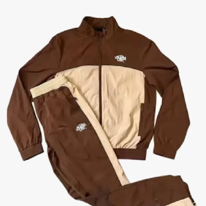 Get the Syna Crest Pack Logo Tracksuit – Brown at an affordable price; a unique, high-quality design available from Syna Worlds.