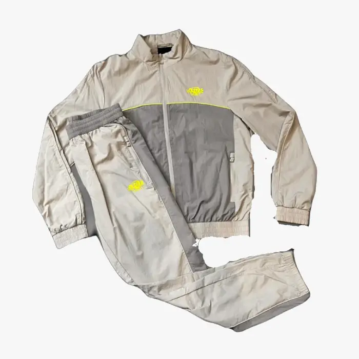 Check out the Syna Logo Shell Tracksuit – Beige . And discover more from your favourite designers at Syna Worlds. Fast delivery and easy returns.