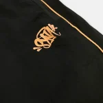 Get the Syna x CRG Black Shell Tracksuit at an affordable price – a unique, high-quality design available at Syna Worlds. Hurry!