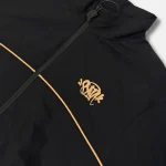 Get the Syna x CRG Black Shell Tracksuit at an affordable price – a unique, high-quality design available at Syna Worlds. Hurry!
