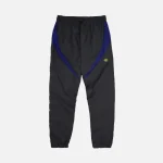 Get the Black Syna World Tracksuit from our official shop. Fast delivery worldwide and easy returns. Limited edition.