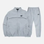 Buy the Syna World Grey Tracksuit for men and women from Syna Worlds. We manufacture this unique design using high-quality materials.
