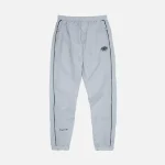 Buy the Syna World Grey Tracksuit for men and women from Syna Worlds. We manufacture this unique design using high-quality materials.