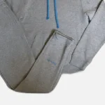Get the Syna Logo Grey/Blue Tracksuit at an affordable price – a unique, high-quality design available at Syna Worlds. Hurry!
