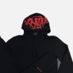 Discover the full Syna Logo Tracksuit – Black/Red Tracksuit at Syna Worlds. Fast delivery worldwide and easy returns.