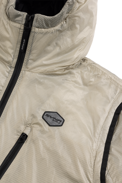 Discover the TRANSLUCENT INSULATED JACKET CREAM at Syna World. We have created this unique design using high-quality materials.