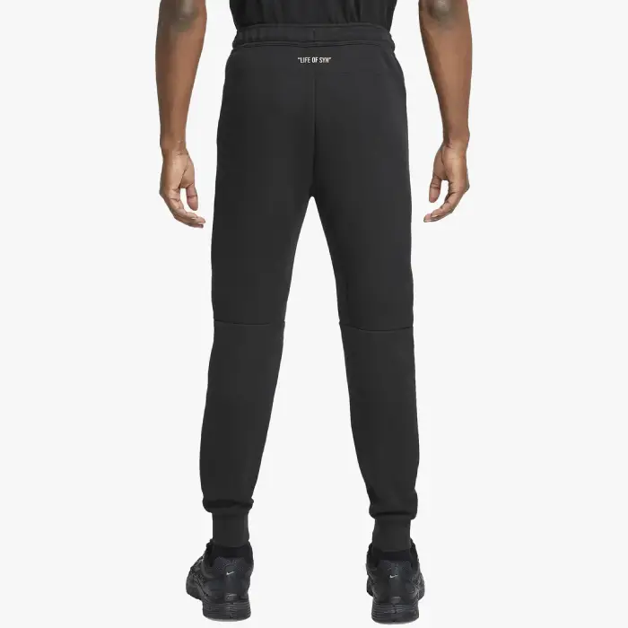 Shop the stylish Black Cee Tech fleece tracksuit bottoms by Syna World x Nike Central from Syna World x Nike Central at Syna World.