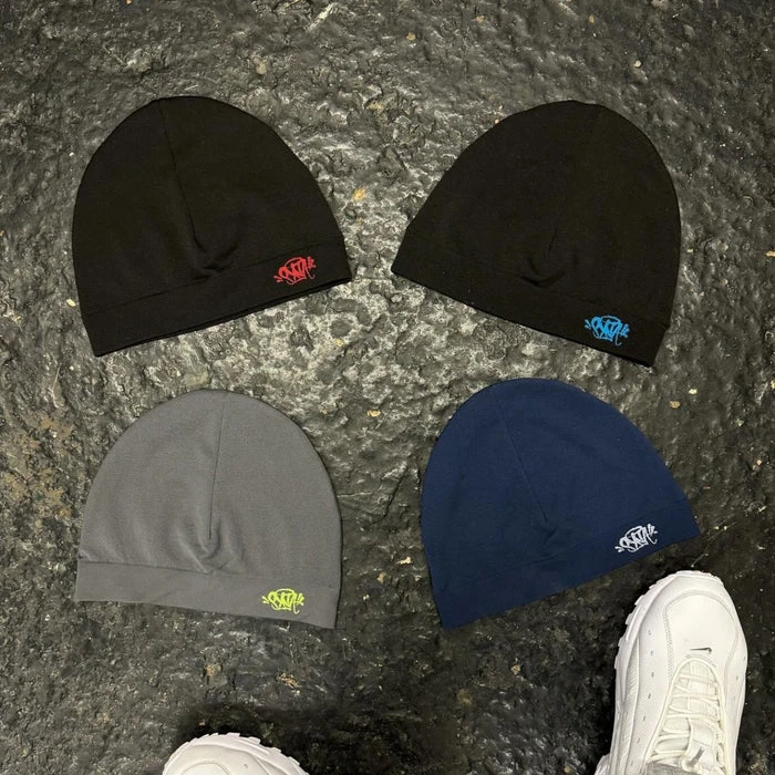 Syna Skull Grey/Yellow Hat by Synaworld. An eye-catching product – add something new to your stock at an affordable price! At Syna Worlds.